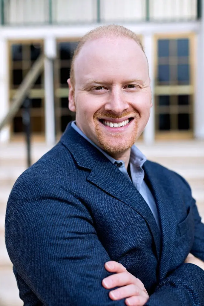Portrait of Dr. Rudy S. Melson wearing a dark blazer.